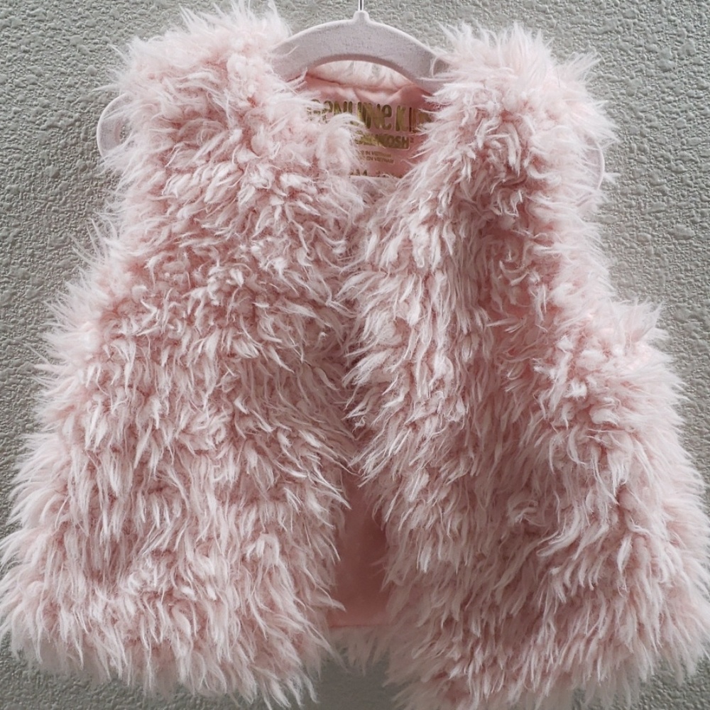 Pink furry vest